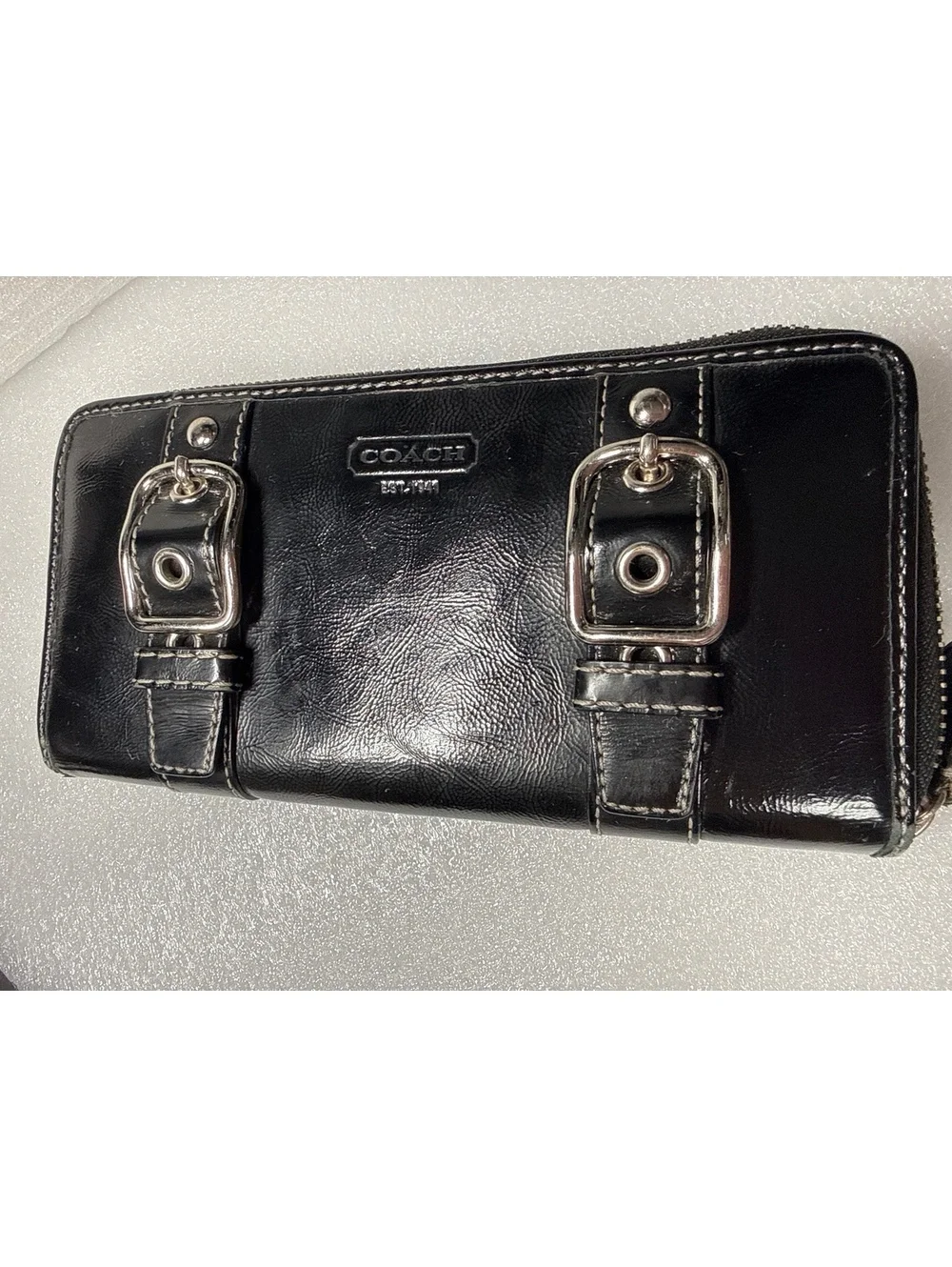 Coach Black Patent Leather Zip Around Wallet Buckle Accent Purple Interior
